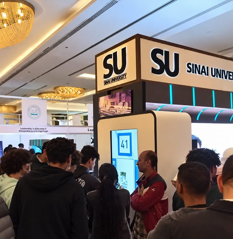 Sinai University booth with an interactive puzzle game